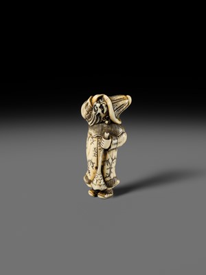 Lot 131 - NIRAKU: AN OSAKA SCHOOL IVORY NETSUKE OF A DUTCHMAN WITH A TRUMPET