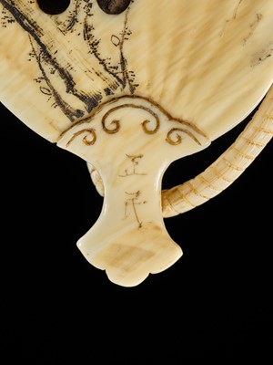 Lot 438 - MASATAMI: A FINE IVORY NETSUKE OF A RAT ON A FAN