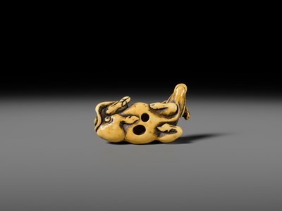 A GOOD KYOTO SCHOOL IVORY NETSUKE OF A RECUMBENT OX