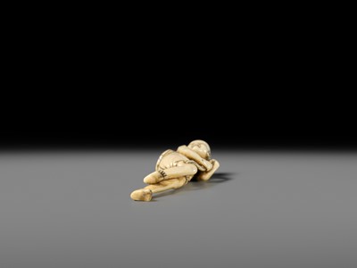 Lot 269 - GYOKUYOSAI: A FINE IVORY NETSUKE OF ASHINAGA WITH A DRUM