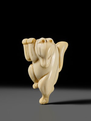 Lot 429 - AN IVORY NETSUKE OF A DANCING KITSUNE