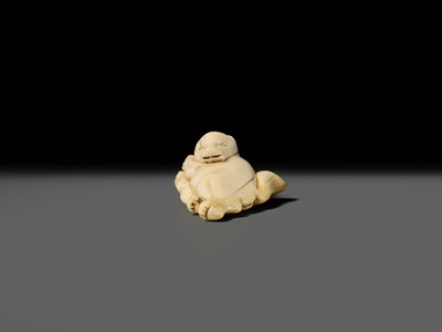 Lot 429 - AN IVORY NETSUKE OF A DANCING KITSUNE