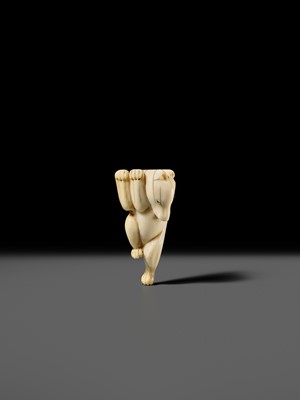 Lot 429 - AN IVORY NETSUKE OF A DANCING KITSUNE
