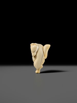 Lot 429 - AN IVORY NETSUKE OF A DANCING KITSUNE