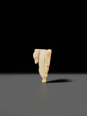 Lot 429 - AN IVORY NETSUKE OF A DANCING KITSUNE
