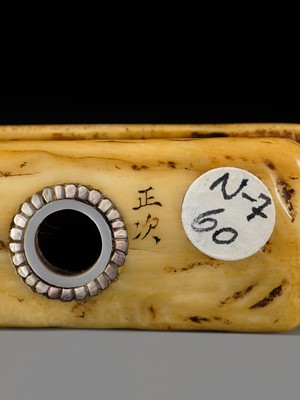 Lot 164 - MASATSUGU: A FINE IVORY NETSUKE OF MONKEYS ON A STRAW HUT
