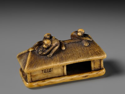 Lot 164 - MASATSUGU: A FINE IVORY NETSUKE OF MONKEYS ON A STRAW HUT