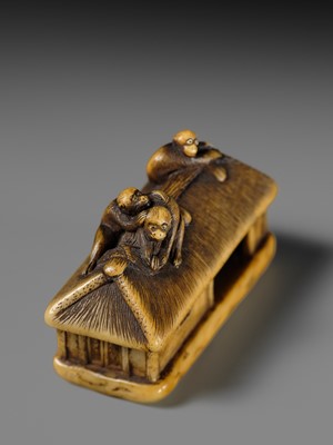 Lot 164 - MASATSUGU: A FINE IVORY NETSUKE OF MONKEYS ON A STRAW HUT
