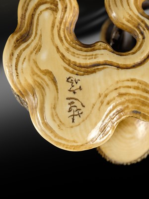 Lot 165 - RANTEI: A SUPERB AND LARGE IVORY NETSUKE OF A COCKEREL WITH TWO HENS AND YOUNG