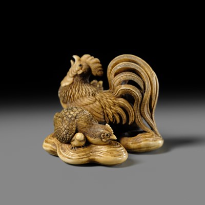 Lot 165 - RANTEI: A SUPERB AND LARGE IVORY NETSUKE OF A COCKEREL WITH TWO HENS AND YOUNG