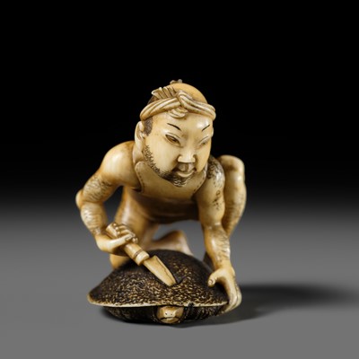 Lot 167 - DORAKU: A SUPERB IVORY NETSUKE OF A FISHERMAN AND TORTOISE