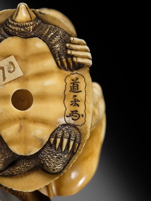 Lot 167 - DORAKU: A SUPERB IVORY NETSUKE OF A FISHERMAN AND TORTOISE