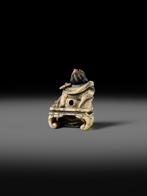 Lot 166 - ANRAKUSAI NOBUKUNI: A SUPERB INLAID IVORY NETSUKE OF SEIOBO