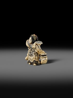 Lot 166 - ANRAKUSAI NOBUKUNI: A SUPERB INLAID IVORY NETSUKE OF SEIOBO
