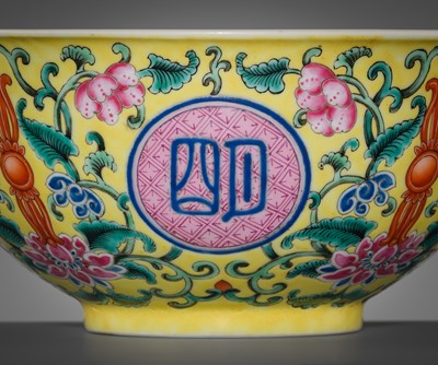 Lot 168 - AN IMPERIAL YELLOW-GROUND FAMILLE ROSE ‘FORI CHANGMING’ BOWL, QIANLONG MARK AND PERIOD