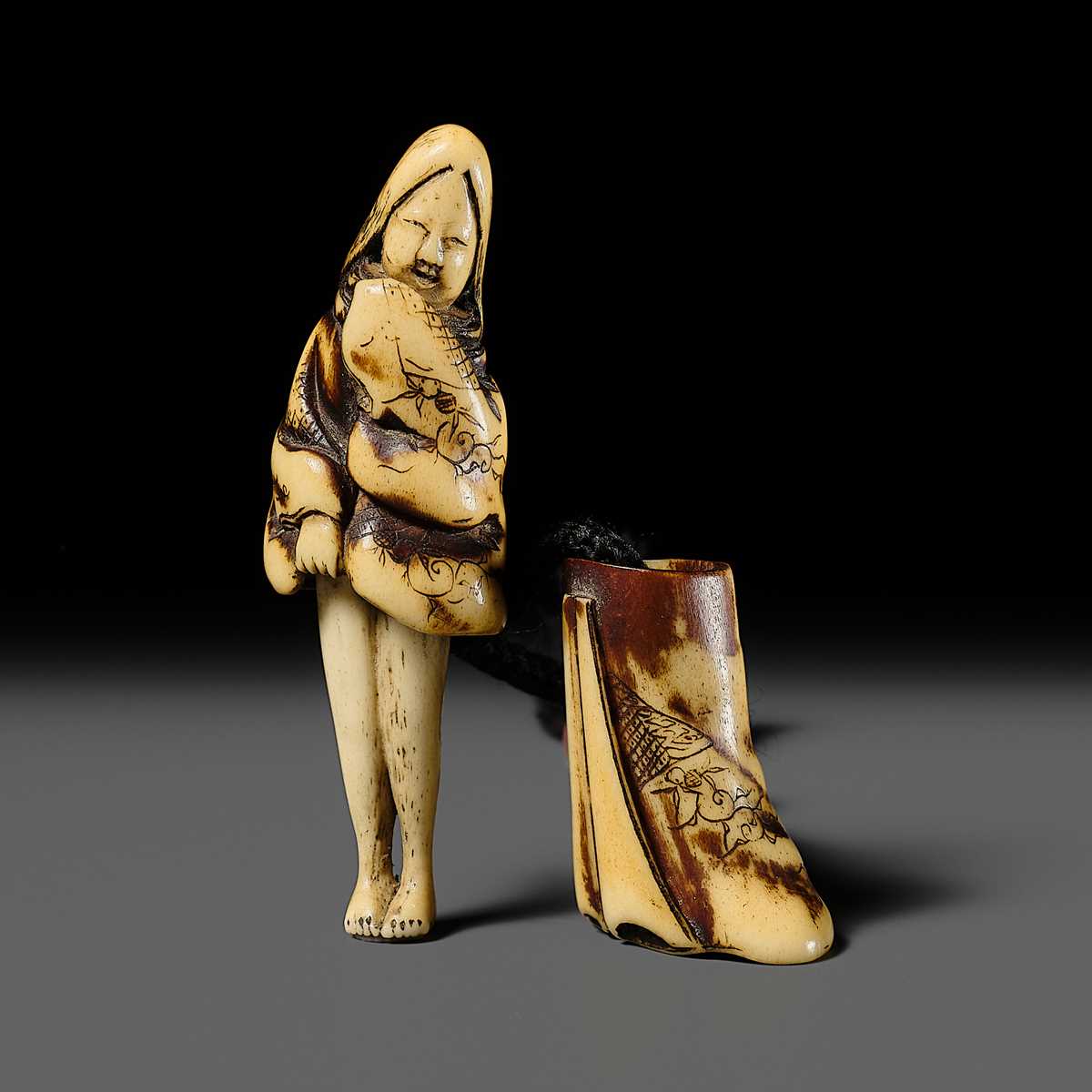 Lot 532 - A RARE ANTLER SHUNGA NETSUKE OF A COURT LADY