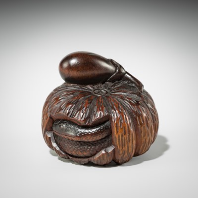 Lot 377 - SHIGEMASA: A FINE WOOD NETSUKE OF A PUMPKIN WITH A SNAKE AND NASUBI (EGGPLANT)