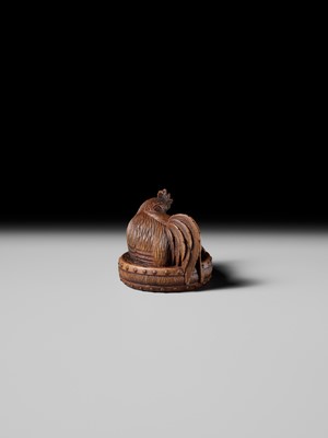 Lot 187 - MASATAMI: A WOOD NETSUKE OF A COCKEREL ON A WAR DRUM