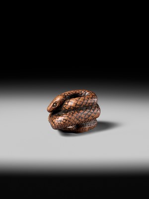 Lot 182 - A LARGE EARLY NAGOYA SCHOOL WOOD NETSUKE OF A SNAKE
