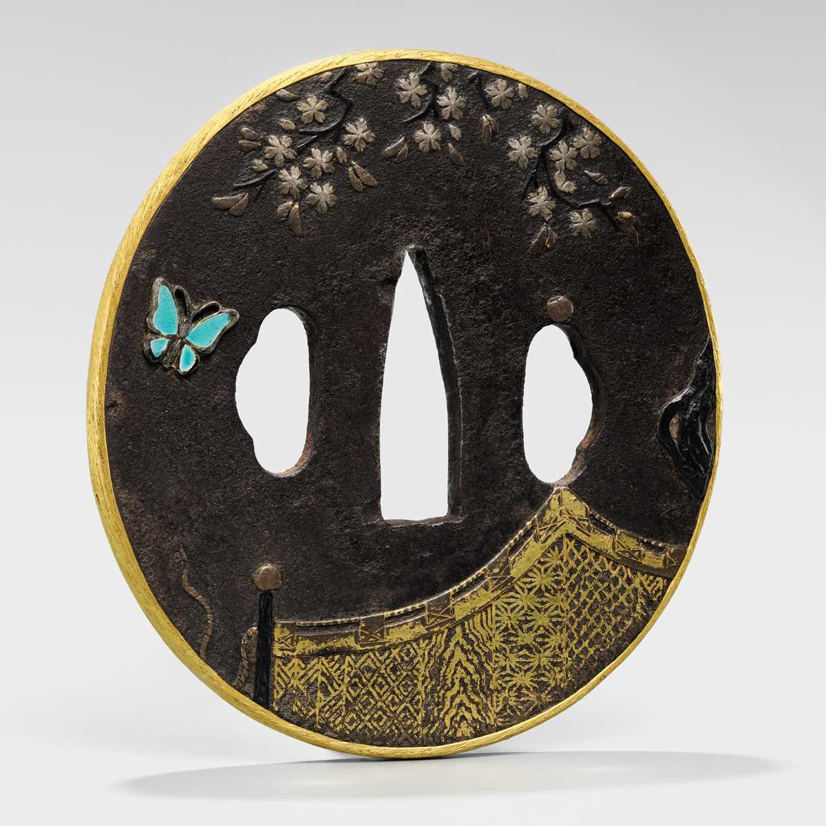 Lot 551 - A RARE SHIPPO INLAID IRON TSUBA, ATTRIBUTED TO HIRATA HIKOZO I