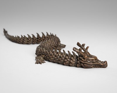 Lot 49 - A BRONZE JIZAI OKIMONO OF A DRAGON