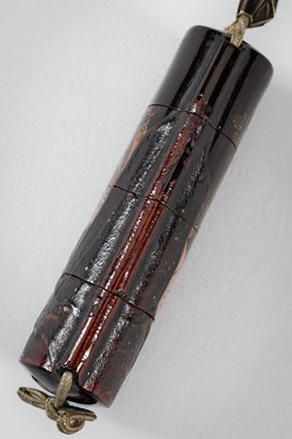 Lot 1415 - A THREE-CASE LACQUER INRO DEPICTING A MOUNTAIN VIEW