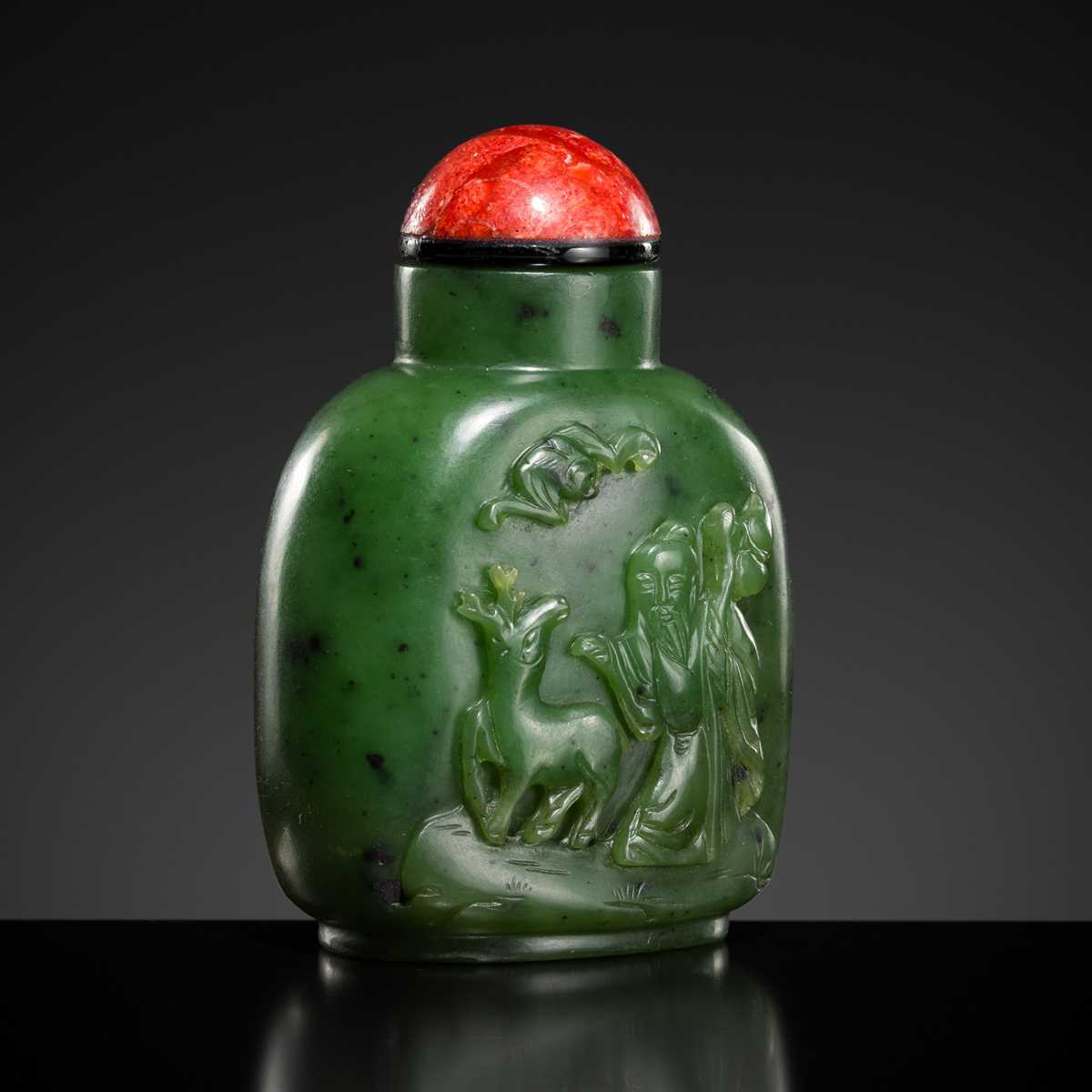 Lot 448 - A SPINACH-GREEN JADE ‘SHOULAO AND DEER’ SNUFF BOTTLE, 18TH-19TH CENTURY