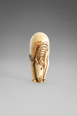 Lot 499 - AN IVORY NETSUKE OF A GRAZING HORSE