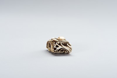 Lot 350 - AN IVORY NETSUKE OF A PEARL DIVER