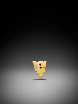 Lot 1491 - AN IVORY NETSUKE OF A DANCING KITSUNE