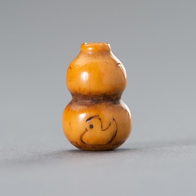 Lot 1521 - A HYOTAN SHAPE IVORY OJIME WITH DUCKS