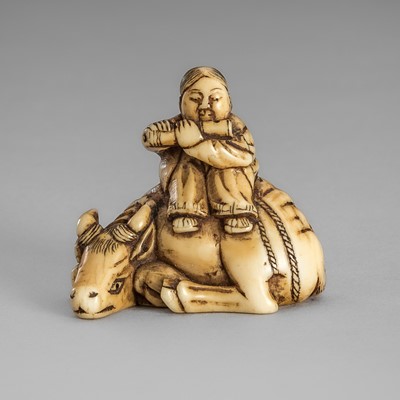 Lot 1655 - RINZAN: AN IVORY NETSUKE OF BOKUDO WITH OX