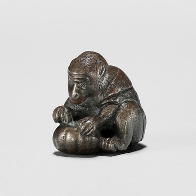 Lot 1724 - A RARE BRONZE NETSUKE OF A MONKEY WITH GOURD