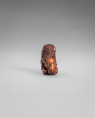 Lot 374 - IKKYU: A WOOD NETSUKE OF AN OWL WITH A MOVABLE OWLET