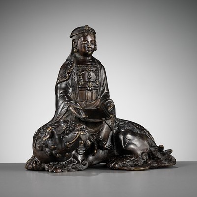 Lot 716 - A BRONZE FIGURE OF WENSHU (MANJUSHRI) ON A LION, LATE MING TO EARLY QING DYNASTY