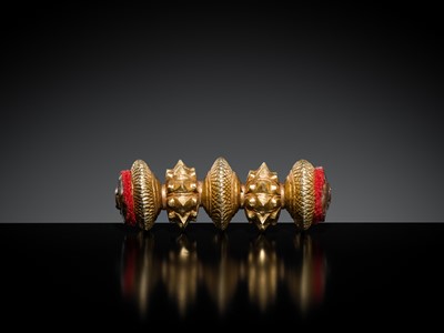 Lot 173 - A LARGE GILT-COPPER TILHARI PENDANT, NEPAL, 19TH – FIRST HALF OF 20TH CENTURY