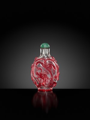 Lot 465 - A RUBY-RED OVERLAY ON TRANSPARENT GLASS ‘CHILONG’ SNUFF BOTTLE, 1740-1840