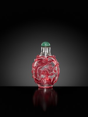 Lot 465 - A RUBY-RED OVERLAY ON TRANSPARENT GLASS ‘CHILONG’ SNUFF BOTTLE, 1740-1840