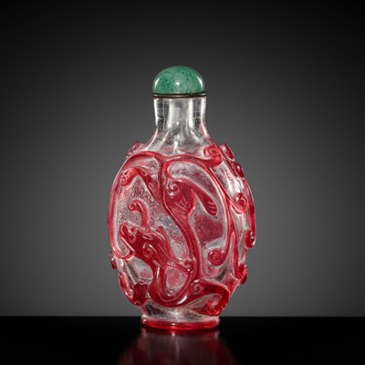 Lot 465 - A RUBY-RED OVERLAY ON TRANSPARENT GLASS ‘CHILONG’ SNUFF BOTTLE, 1740-1840