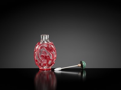 Lot 465 - A RUBY-RED OVERLAY ON TRANSPARENT GLASS ‘CHILONG’ SNUFF BOTTLE, 1740-1840