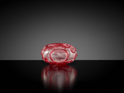 Lot 465 - A RUBY-RED OVERLAY ON TRANSPARENT GLASS ‘CHILONG’ SNUFF BOTTLE, 1740-1840