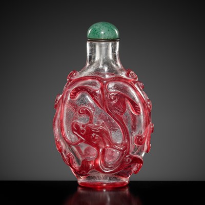 Lot 465 - A RUBY-RED OVERLAY ON TRANSPARENT GLASS ‘CHILONG’ SNUFF BOTTLE, 1740-1840