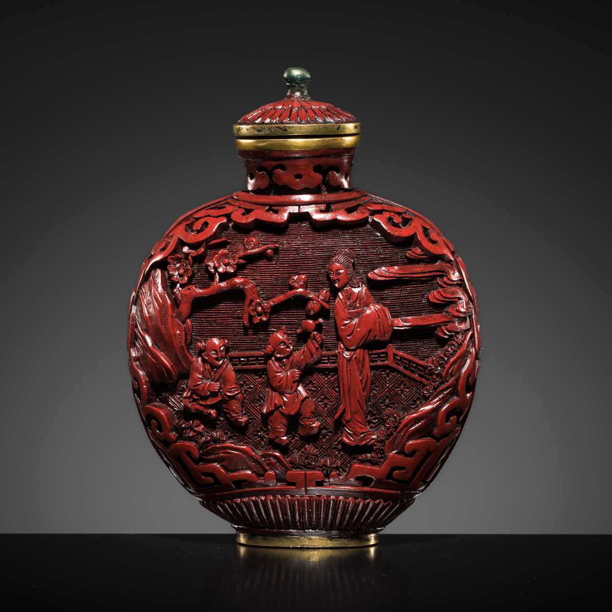 Lot 469 - A CINNABAR LACQUER ‘COURT LADIES’ SNUFF BOTTLE, 19TH CENTURY