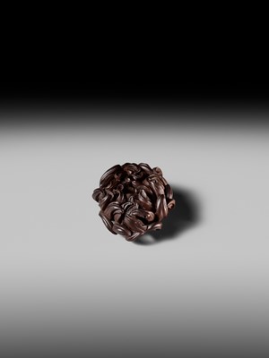Lot 289 - TSUKAMOTO KYOKUSAI: A SUPERB SO SCHOOL WOOD NETSUKE OF A FLOWERING CHRYSANTHEMUM