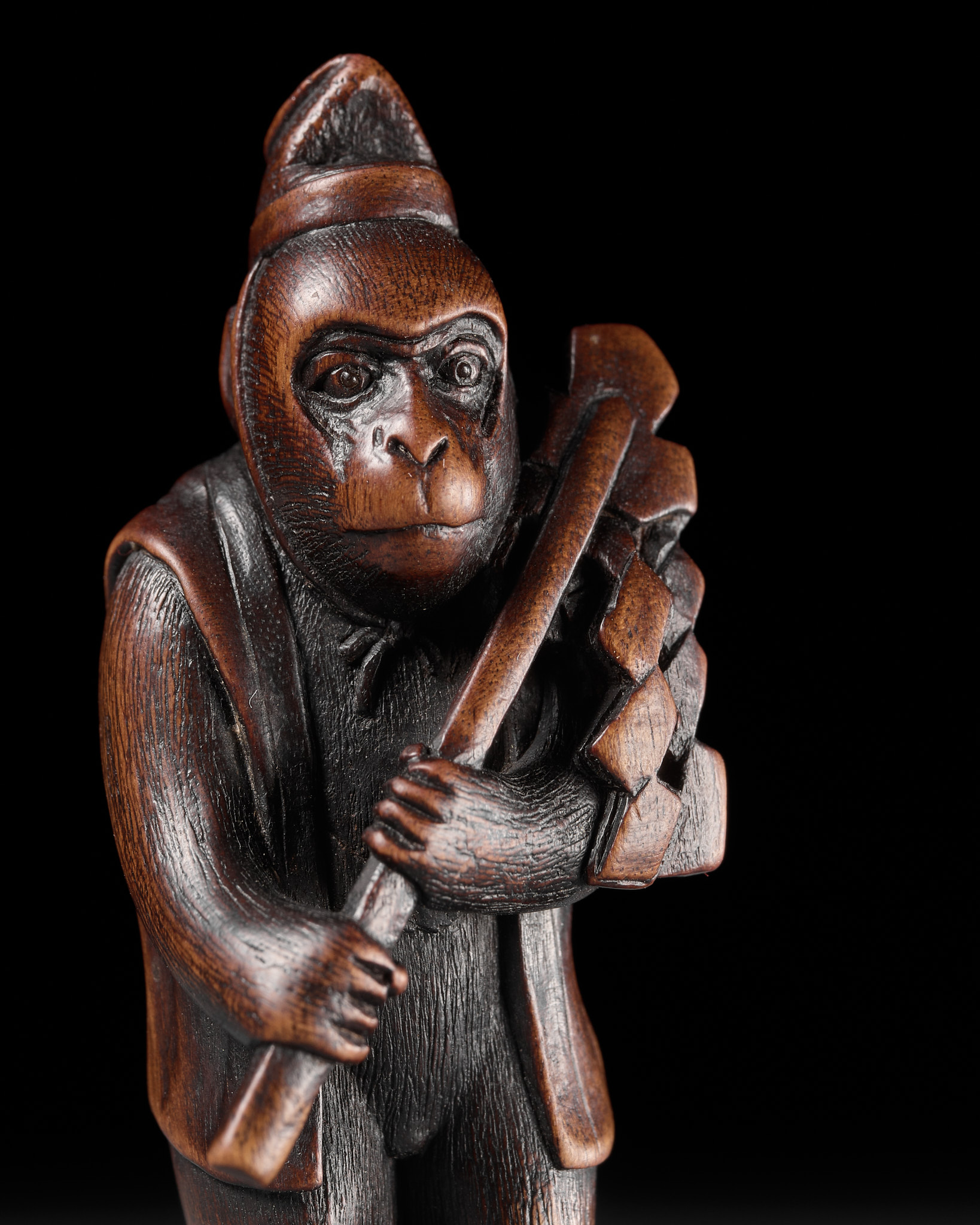 Lot 211 - KANO TOMOKAZU: A FINE WOOD NETSUKE OF A