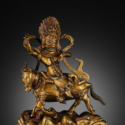Lot 16 - A GILT BRONZE FIGURE OF SRI DEVI, PALDEN LHAMO, TIBET, 18TH CENTURY