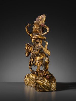 Lot 16 - A GILT BRONZE FIGURE OF SRI DEVI, PALDEN LHAMO, TIBET, 18TH CENTURY