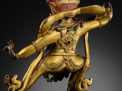 Lot 348 - A GILT BRONZE FIGURE OF YAMA DHARMARAJA, QING DYNASTY, 18TH CENTURY