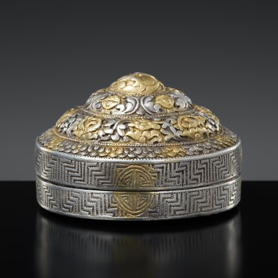 Lot 211 - A PARCEL-GILT SILVER LIME CONTAINER, 19TH CENTURY