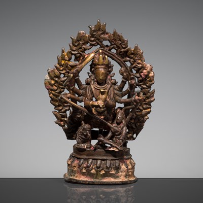 Lot 84 - A SMALL BRONZE FIGURE OF DURGA SLAYING THE BUFFALO DEMON, 17TH-18TH CENTURY